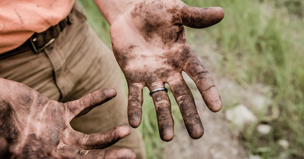 Man with dirty hands